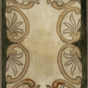 Beige rug with a hooked texture and an ornamental border design in brown, taupe, and dark green.