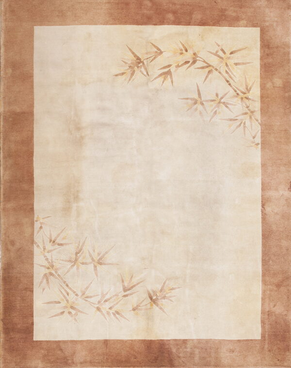 Beige rug featuring a solid brown border and faded bamboo leaf motifs in opposing corners.