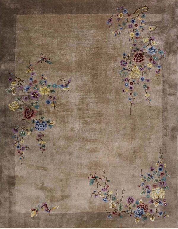 A shimmery taupe rug featuring multicolored naturalistic floral and butterfly motifs along the borders.