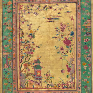 Yellow-gold rug with lush floral patterns, a central pagoda, and a wide variegated emerald green border.
