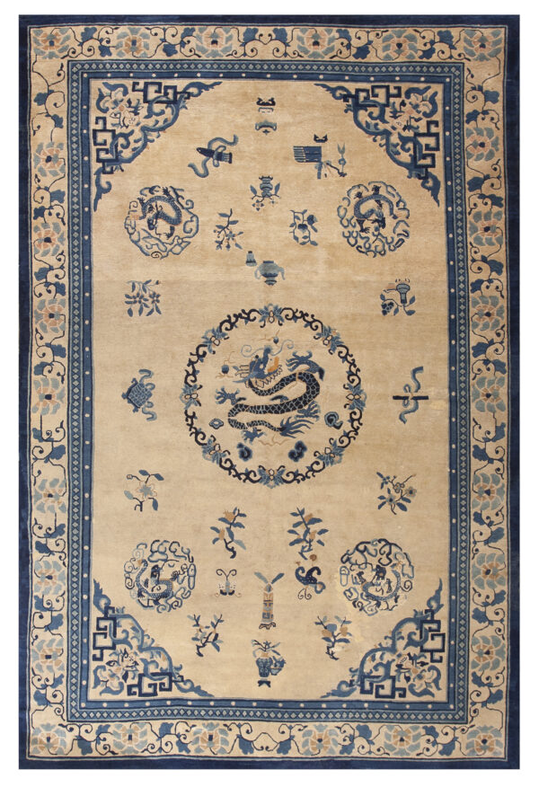 A beige rug featuring a central dark blue dragon motif and intricate floral and geometric borders.