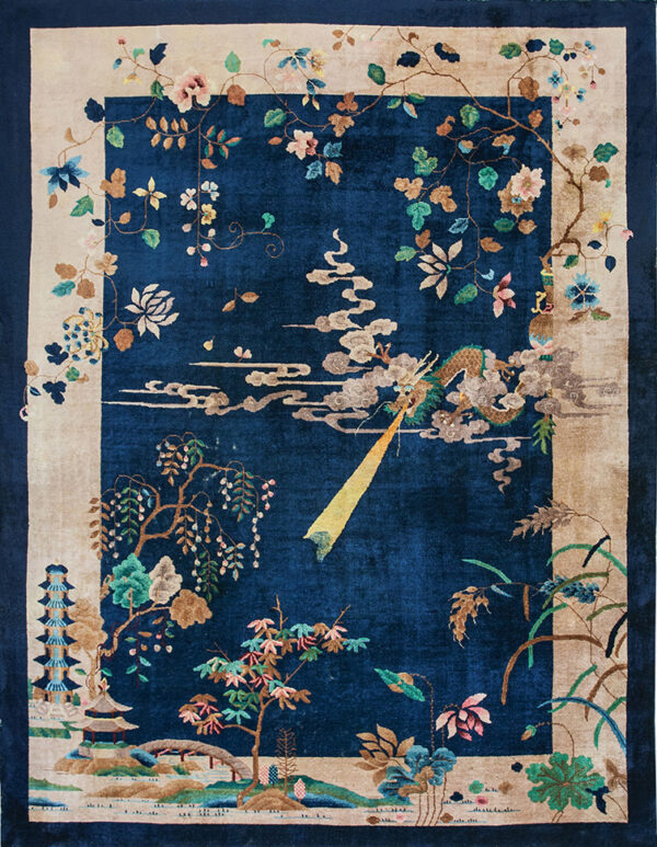 Navy blue rug with a scenic landscape pattern including a dragon, pagodas, trees, and multi-colored floral borders.
