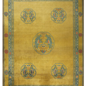 Saffron yellow rug with repeating fretwork, five blue dragon medallions, and ornate teal and red borders.