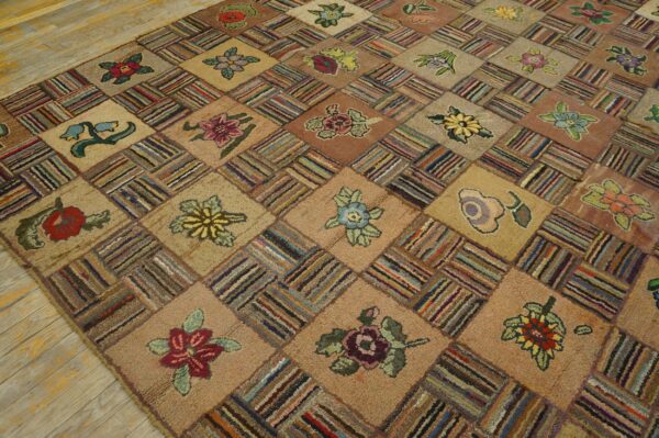 A highly textured patchwork rug features alternating floral motifs and multicolored striped squares on wood flooring.