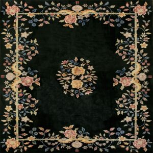 Black rug with a pink, yellow, and blue floral border and center medallion design.