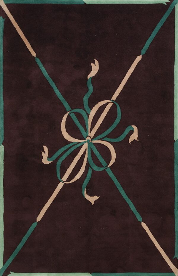 Deep brown rug featuring a beige and teal ribbon design overlaying crossed diagonal lines.