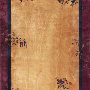 Rectangular rug with a gold field, dark purple border, and stylized floral and vine motifs.