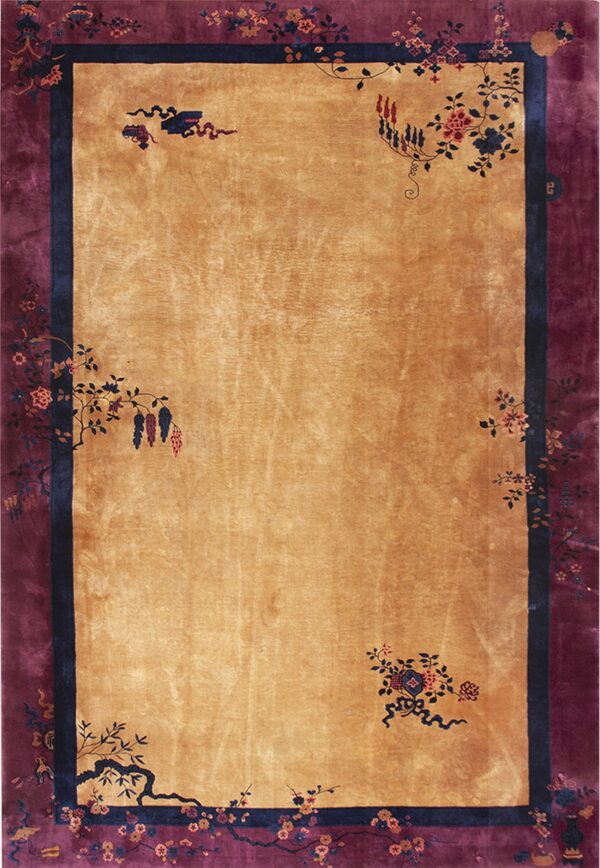 Rectangular rug with a gold field, dark purple border, and stylized floral and vine motifs.