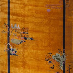 High-sheen gold rug featuring a navy frame and intricate floral and tree designs in the corners.