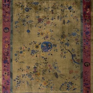 Muted gold rug with a detailed vine and flower pattern, bordered by magenta and slate blue bands.