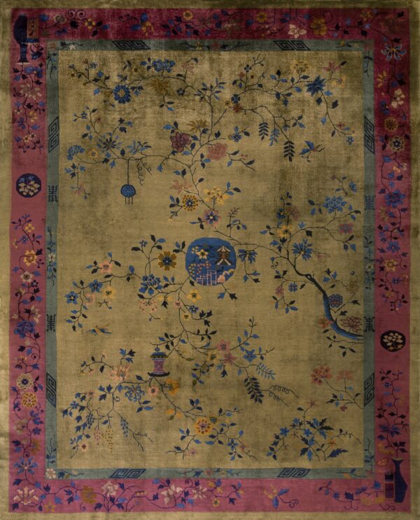 Muted gold rug with a detailed vine and flower pattern, bordered by magenta and slate blue bands.