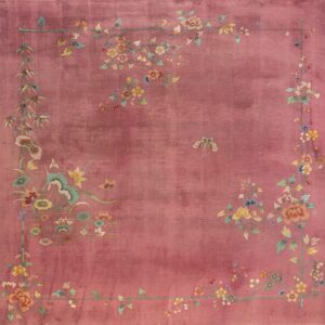 Velvety rose square rug featuring a delicate floral border and vines with multicolored blossoms and a central butterfly.
