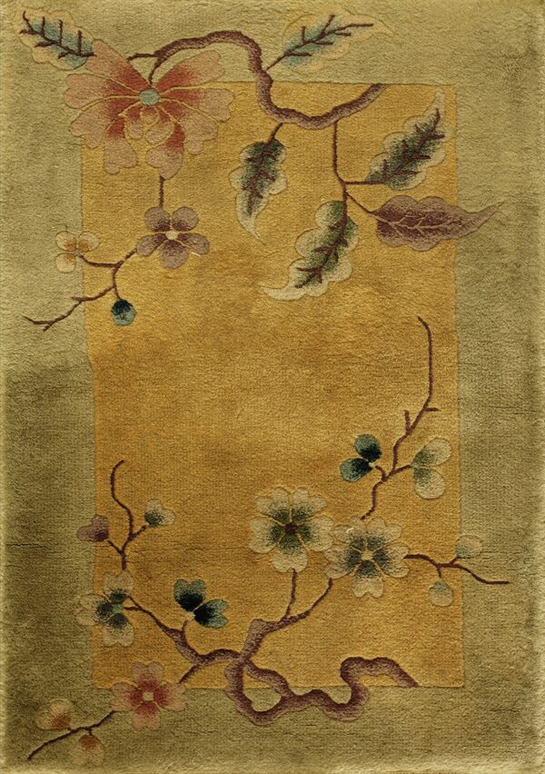 Gold-field rug featuring winding branches and pink and green floral patterns within an olive green border.
