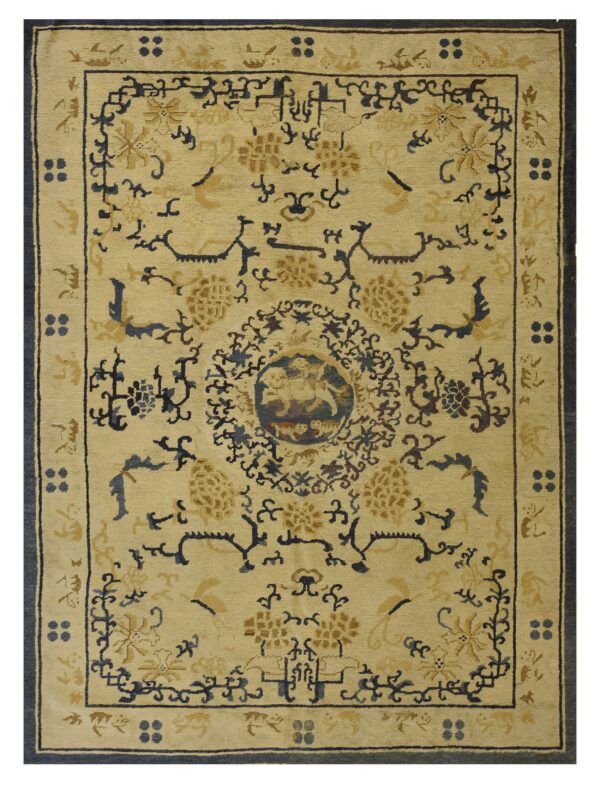 Pale yellow rug featuring a dark blue and gold traditional pattern with a detailed central medallion and border.