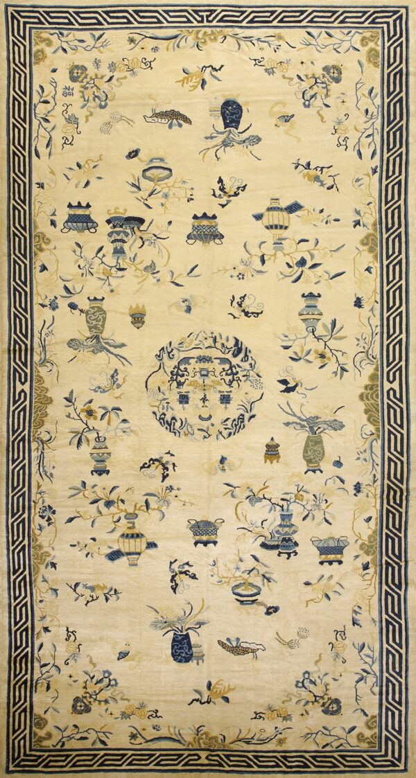Cream rug with a wide blue geometric border and scattered blue and gold vases and floral motifs.