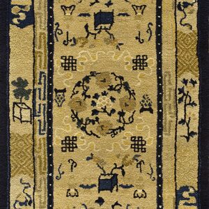 A runner rug with a gold field, navy borders, and traditional blue Chinese pictorial motifs.