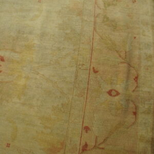 Antique Turkish Borlou Oushak rug with ivory field, large-scale floral palmettes, and soft pastel border, hand-knotted wool oversized carpet from the early 20th century