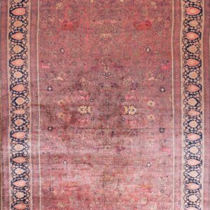 Rose field rug with deep navy borders featuring light boteh and detailed floral and animal patterns.