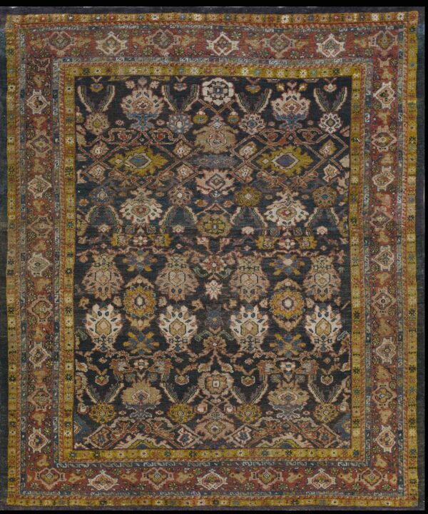 Dark navy oriental rug featuring traditional motifs in red, gold, and light blue with complex, multi-layered borders.