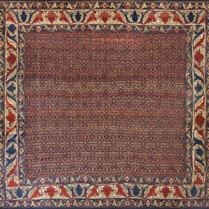 Deep red rug featuring a crowded field and wide navy border with stylized red and cream animal motifs.
