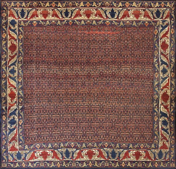 Deep red rug featuring a crowded field and wide navy border with stylized red and cream animal motifs.