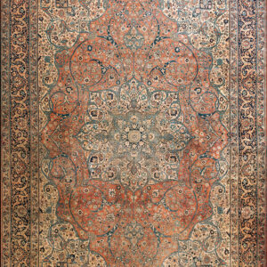 Traditional rug with a large terracotta medallion, dense floral patterns, and navy blue borders.