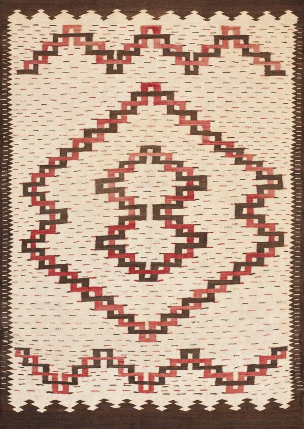Cream flatweave rug featuring a central red and brown stepped geometric diamond pattern and a dark border.