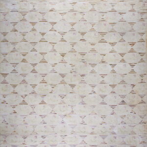 Ivory rug with brown and mauve striped hourglass motifs over a faint floral pattern.