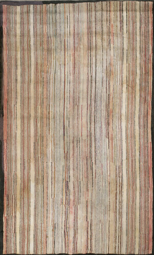 Vertical striped rug featuring beige, red, gray, and blue threads, framed by a dark border.