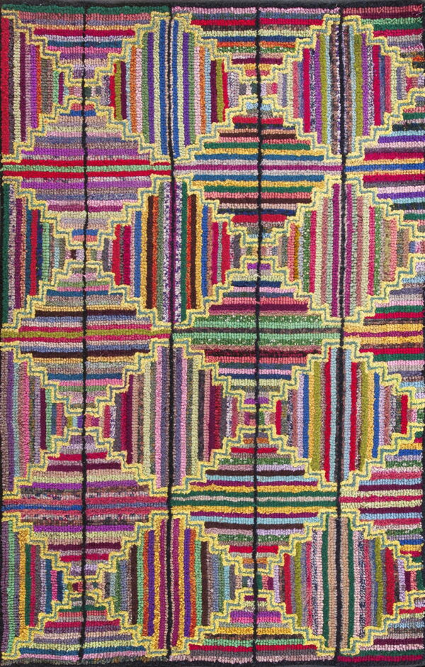 Multicolored hooked rug with a geometric log cabin pattern outlined by bright yellow zigzag borders.