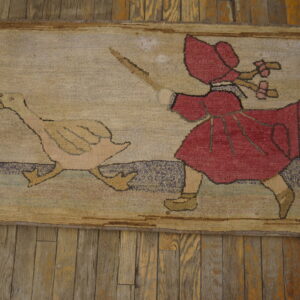 Textured beige rug featuring a red-hooded figure chasing a goose on rustic wood planks.