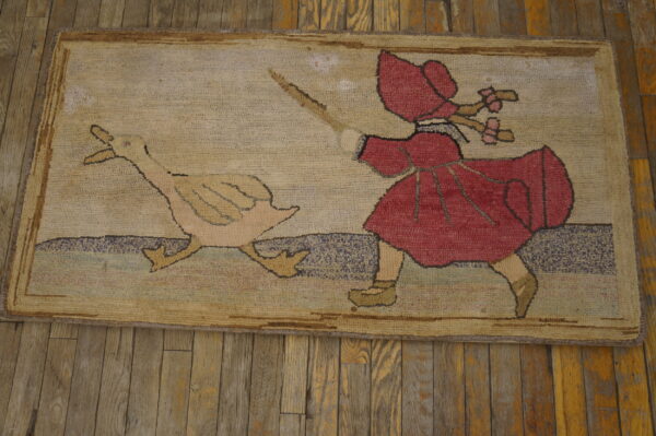 Textured beige rug featuring a red-hooded figure chasing a goose on rustic wood planks.