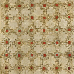 Textured beige rug with a repeating geometric pattern of red squares and intricate brown and gray outlines.