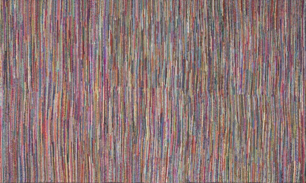A highly textured rug featuring thin, vertical, multicolored stripes across the entire surface.