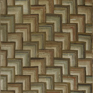 Textured rug featuring a staggered geometric pattern of brown, tan, sage green, and muted blue L-shapes.