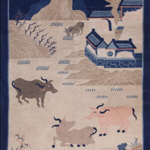 Pictorial rug featuring oxen, tan mountains, and blue buildings against a navy background and border.