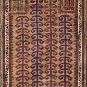 Geometric rug featuring a brown field, navy and maroon stylized patterns, and contrasting zigzag borders.
