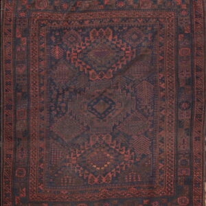 Dark blue and rust traditional geometric rug featuring low pile, multiple borders, and patterned flatwoven ends.