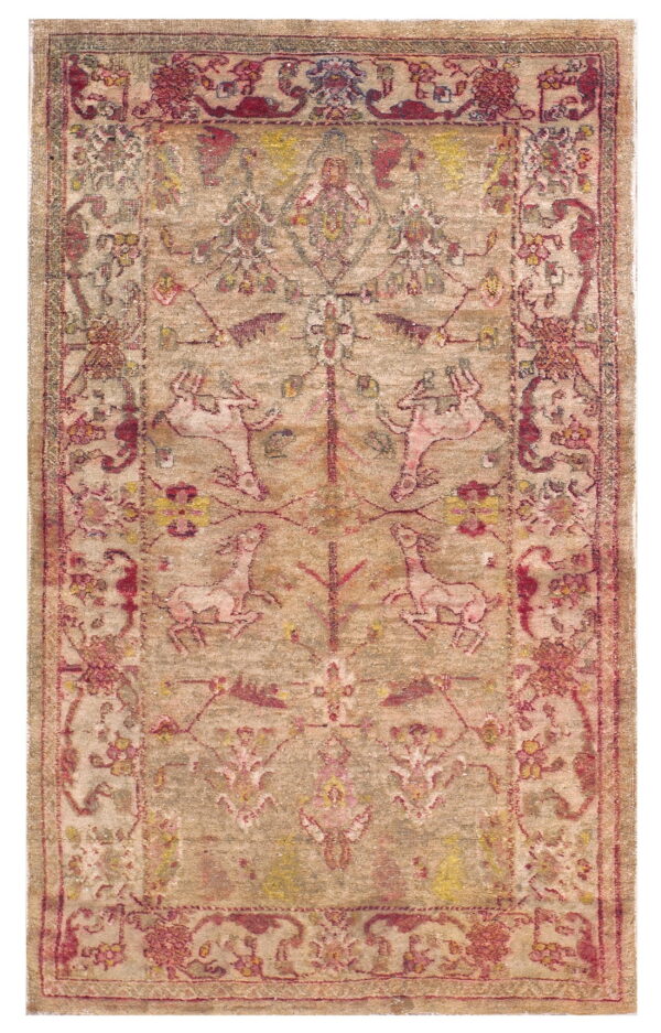 Faded, low-pile rug featuring stylized animals and botanicals in muted beige, red, pink, and yellow colors.