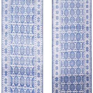 Two distressed indigo and white runner rugs with geometric medallions, star borders, and low pile.