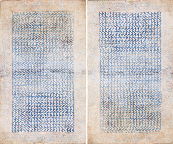 Distressed blue and cream textile displayed as two vertical halves, featuring a dense repeating geometric pattern.