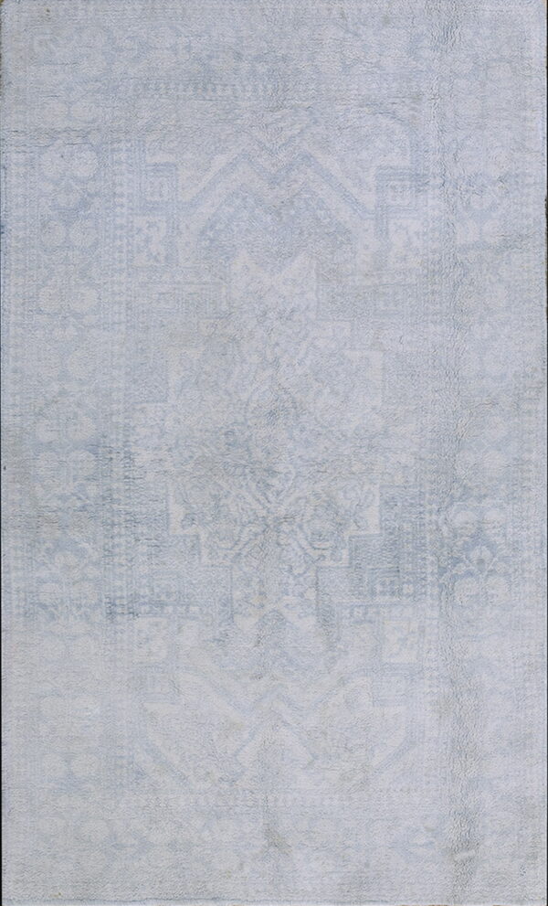 Light gray rectangular area rug with a subtly faded traditional medallion pattern.