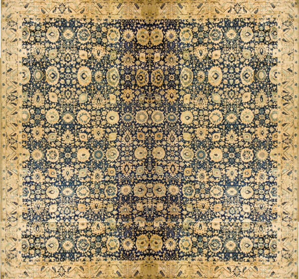 Dense gold and light blue botanical motifs cover a dark blue rug field bordered by a wide golden band.