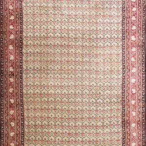 Cream rug featuring a repeating red and black trellis pattern and wide decorative red floral borders.