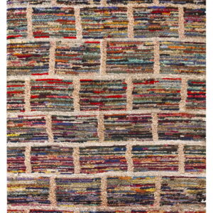 Close-up of a shaggy rug with a beige lattice pattern enclosing colorful horizontal stripes.