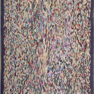 A high-pile, multicolored abstract rug with textured strips of color and a solid dark purple border.