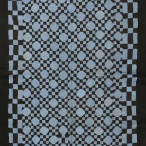Full-length black and light blue geometric rug featuring large diamond shapes surrounded by a small checkerboard grid.