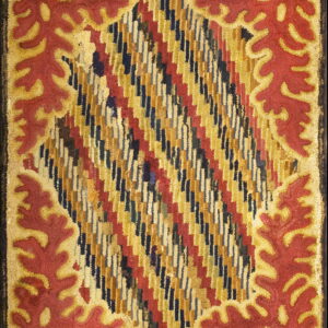 Highly textured rug displaying a central multi-color diagonal design framed by a bold red and gold leafy border.