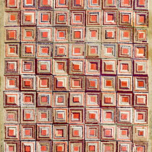 Textured rug displaying a geometric pattern of red-orange, beige, white, and multicolored concentric squares.