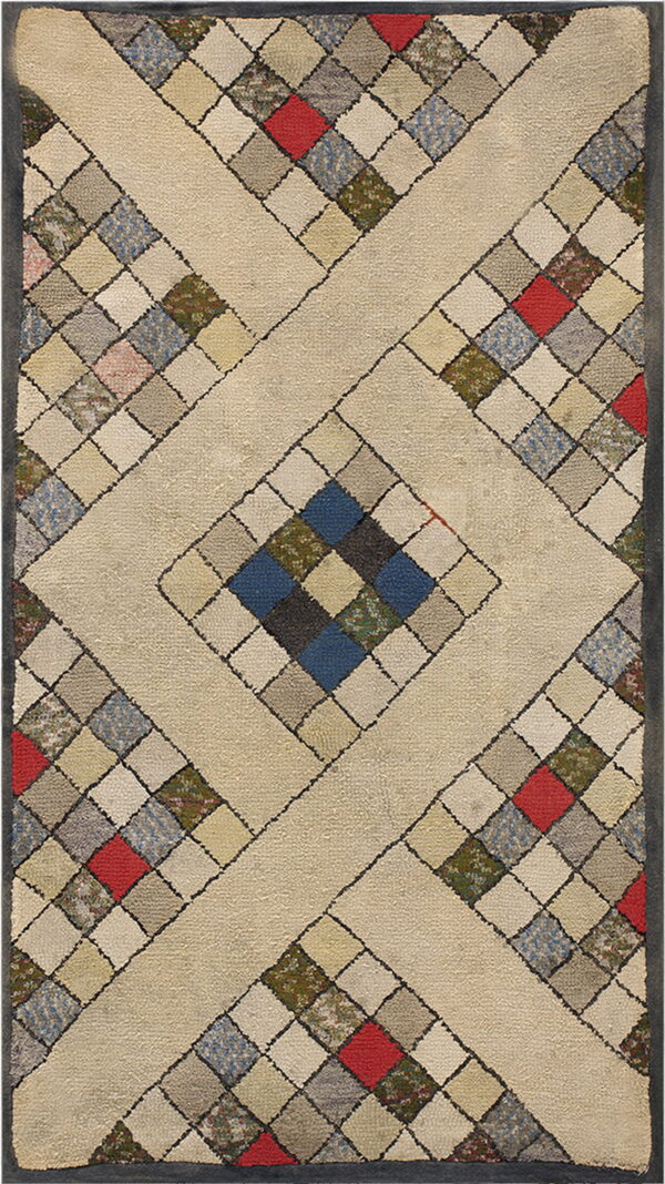 Textured rug with a cream diamond pattern surrounding multicolored squares in red, blue, green, and gray.